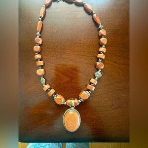 Brand new Goldstone antique white metal pendant necklace